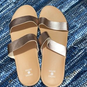 Selling a pair of sandals I wore once. Size 10 shade and shore brand.